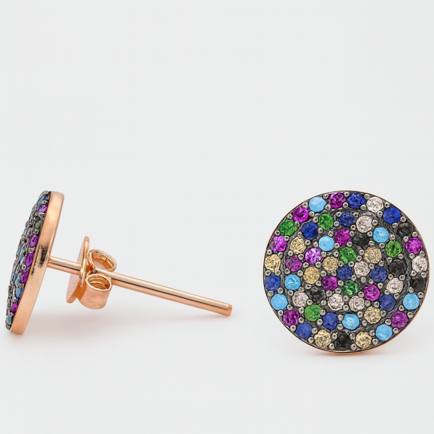 Multicolored gemstone earrings on a white background