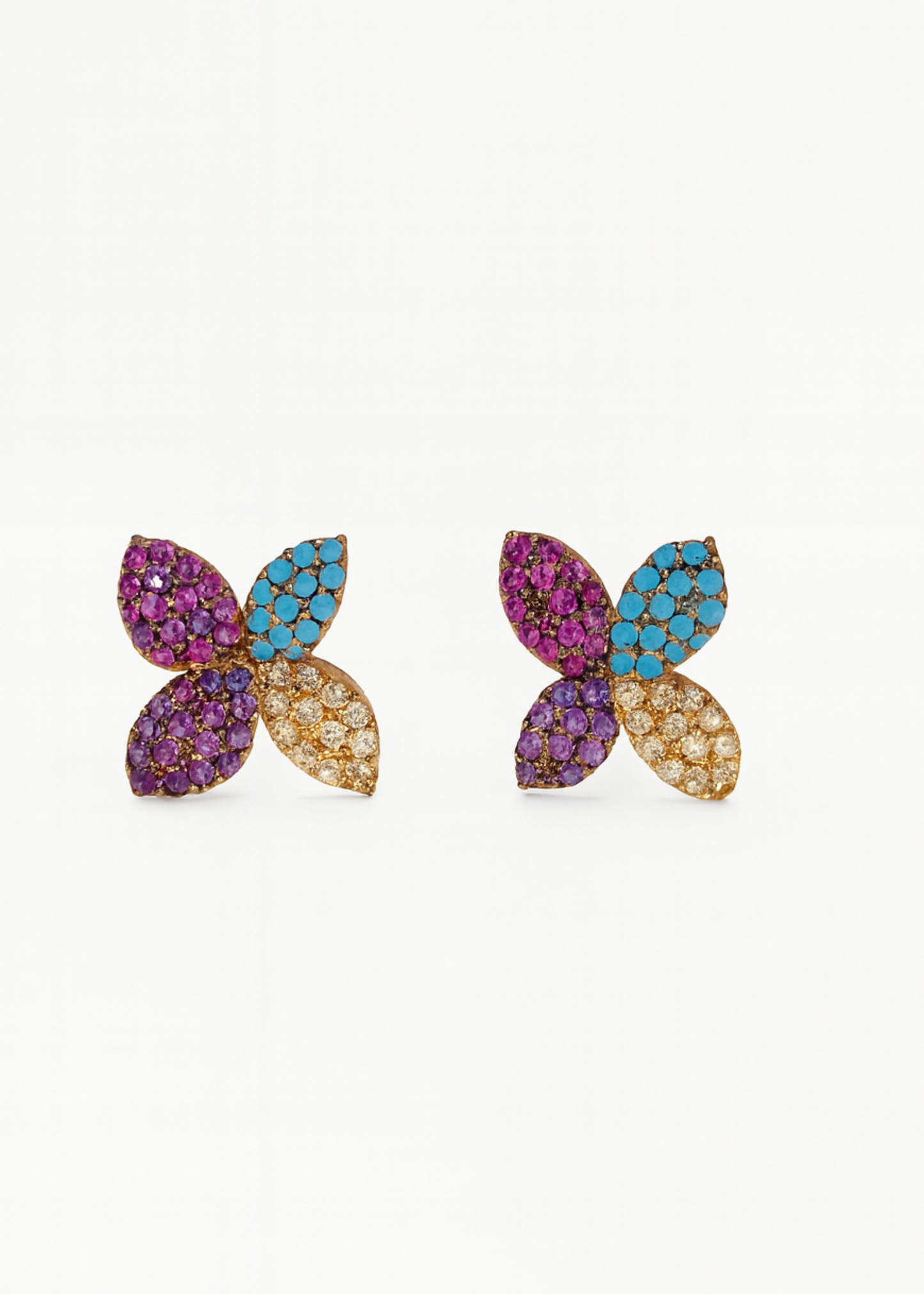 Butterfly-shaped earrings with colorful gemstones on a white background