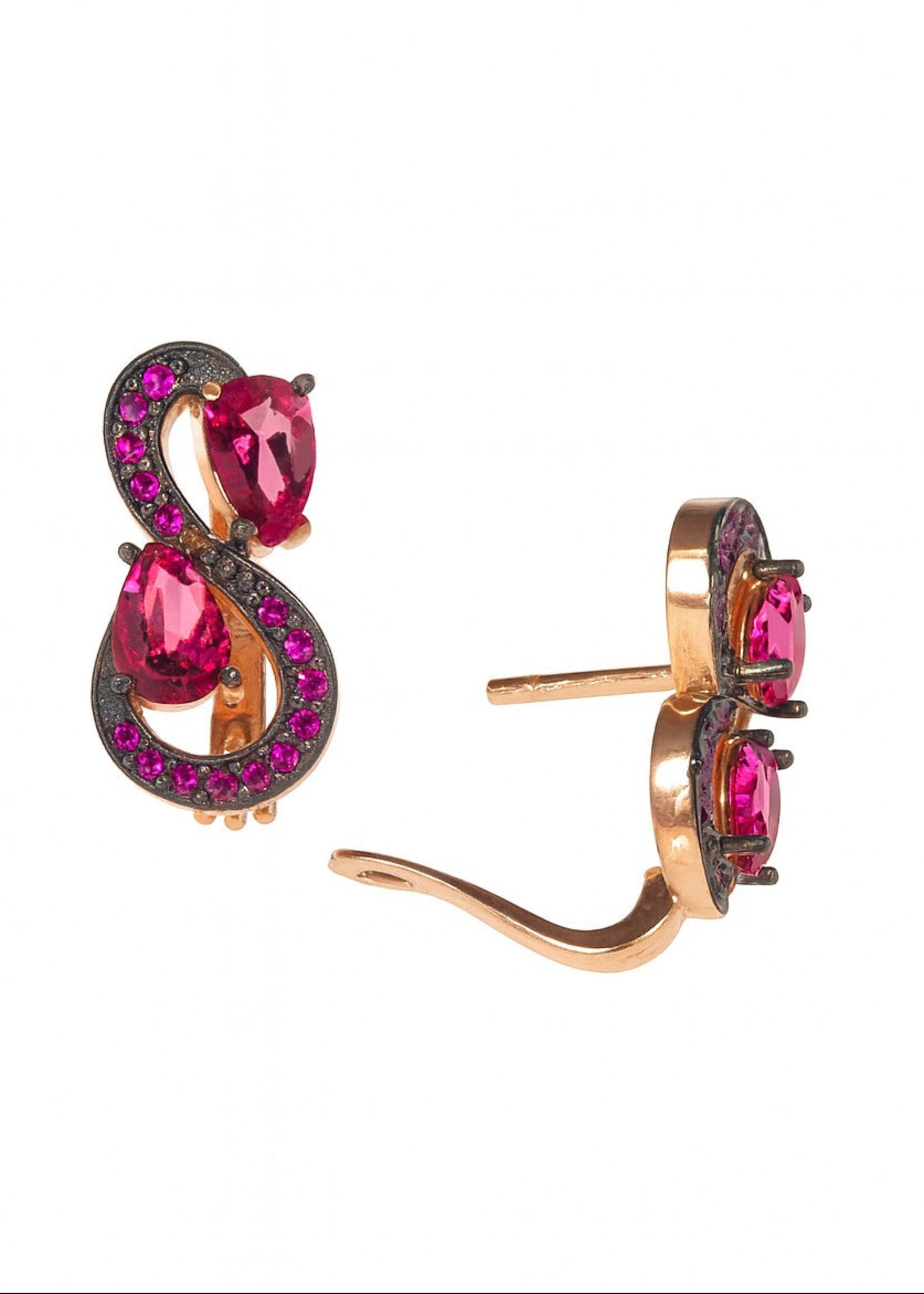 Pair of earrings with pink gemstones on a white background