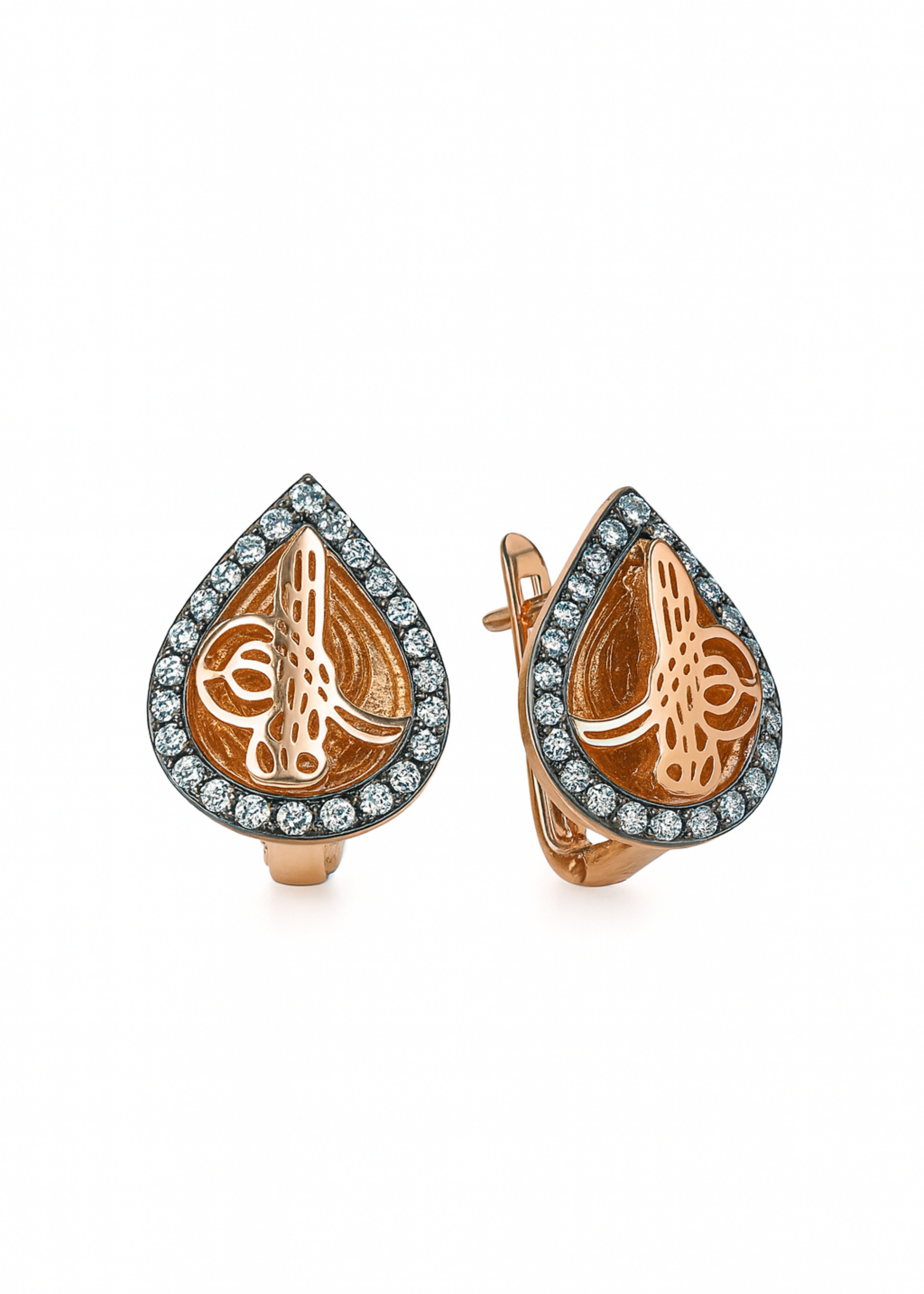 Pair of rose gold earrings with intricate designs on a white background
