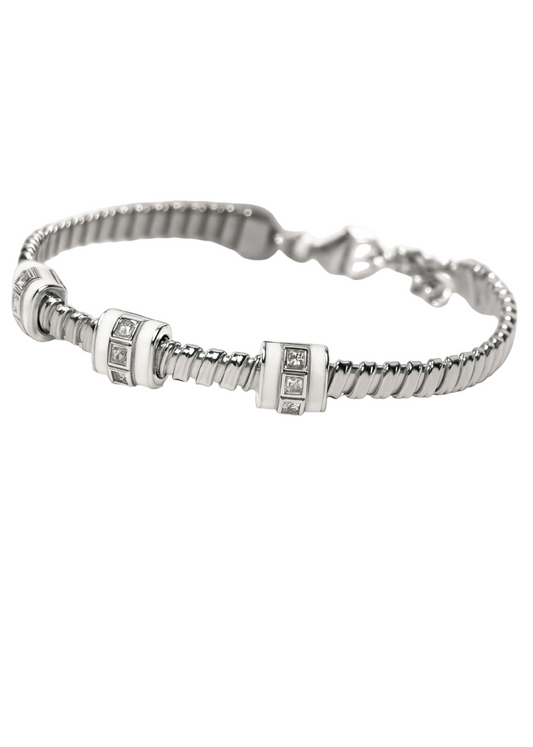 Silver bracelet with diamond accents on a white background