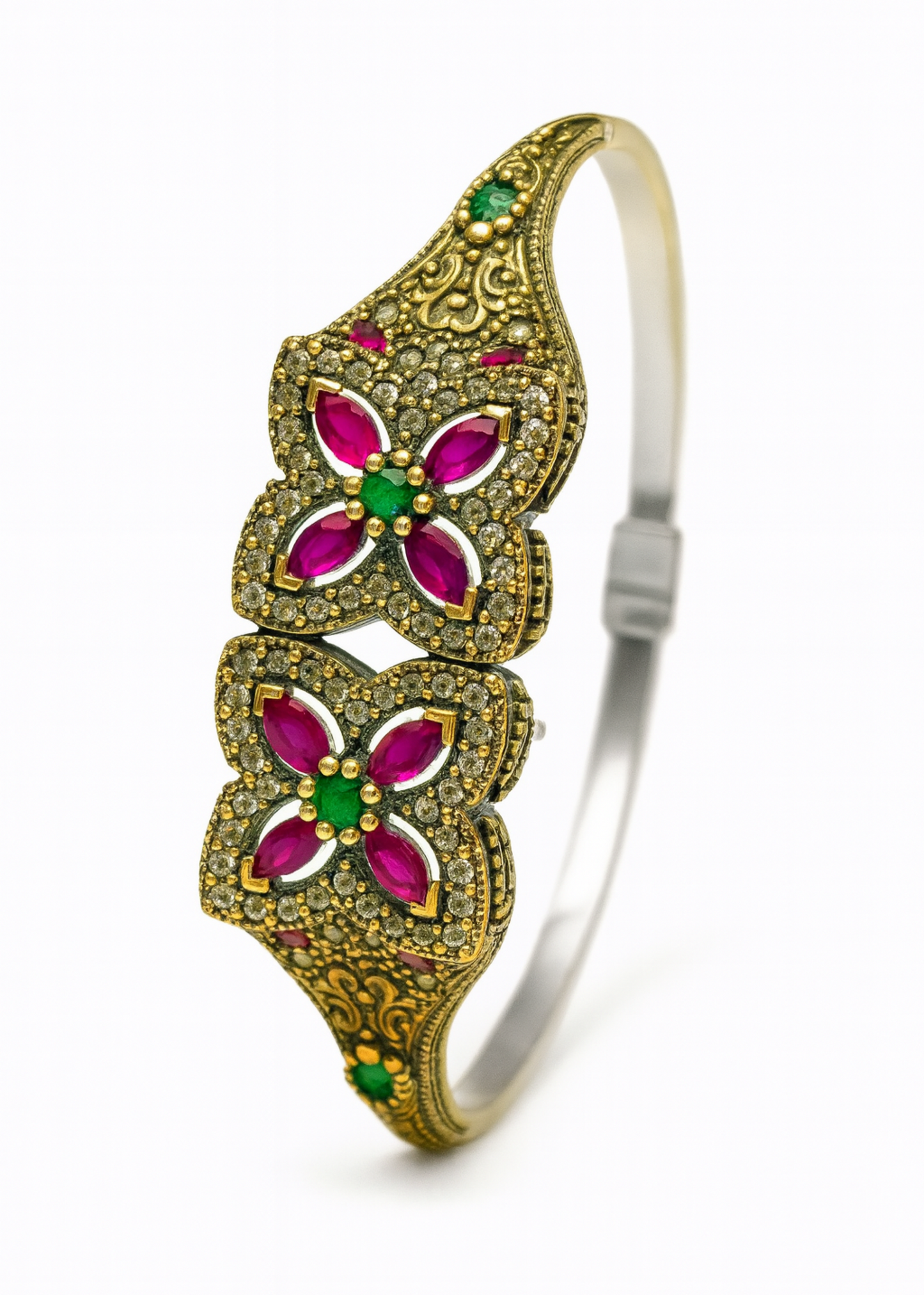 Decorative bracelet with floral designs and gemstones on a white background