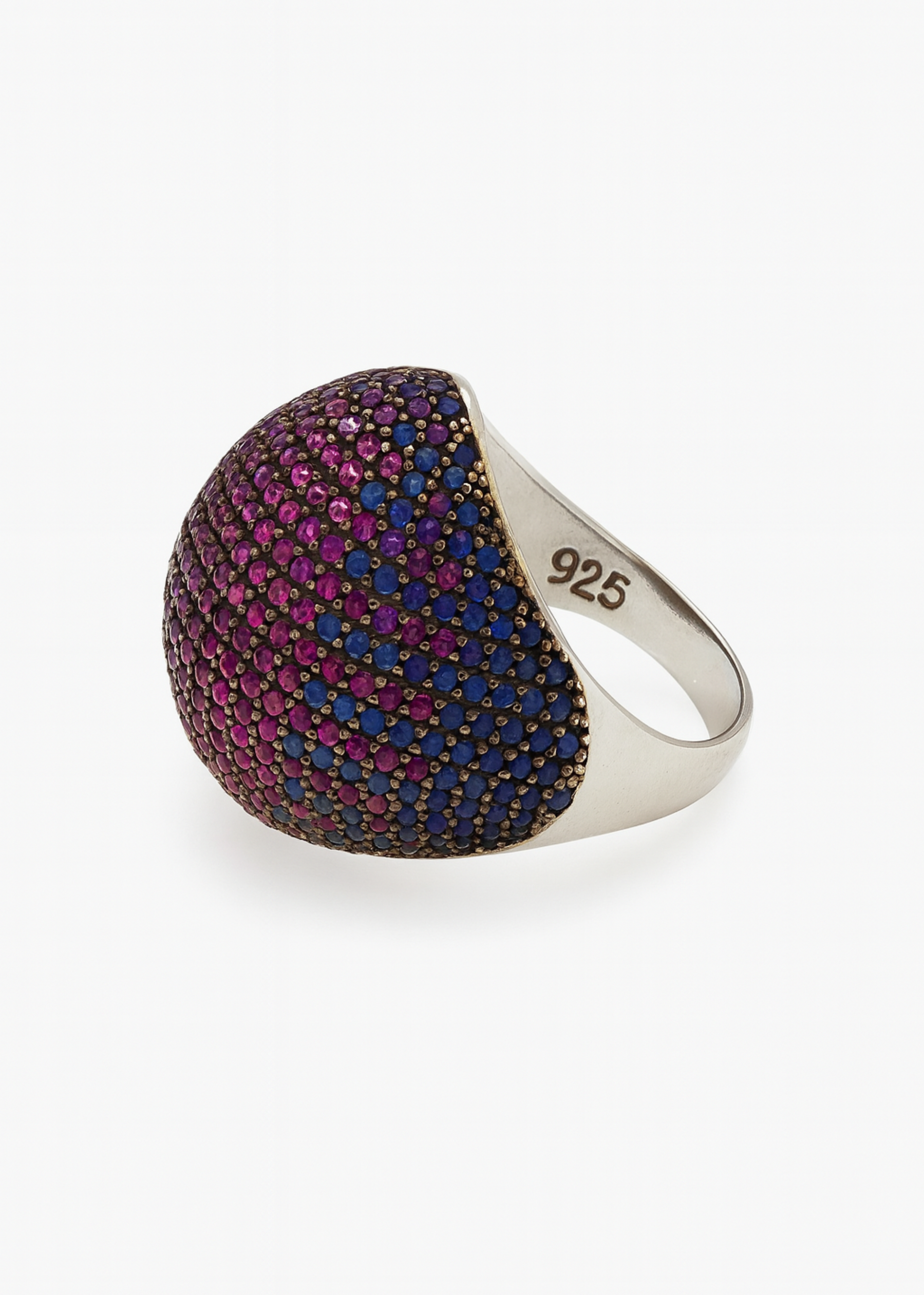Ring with multicolored gemstones on a white background