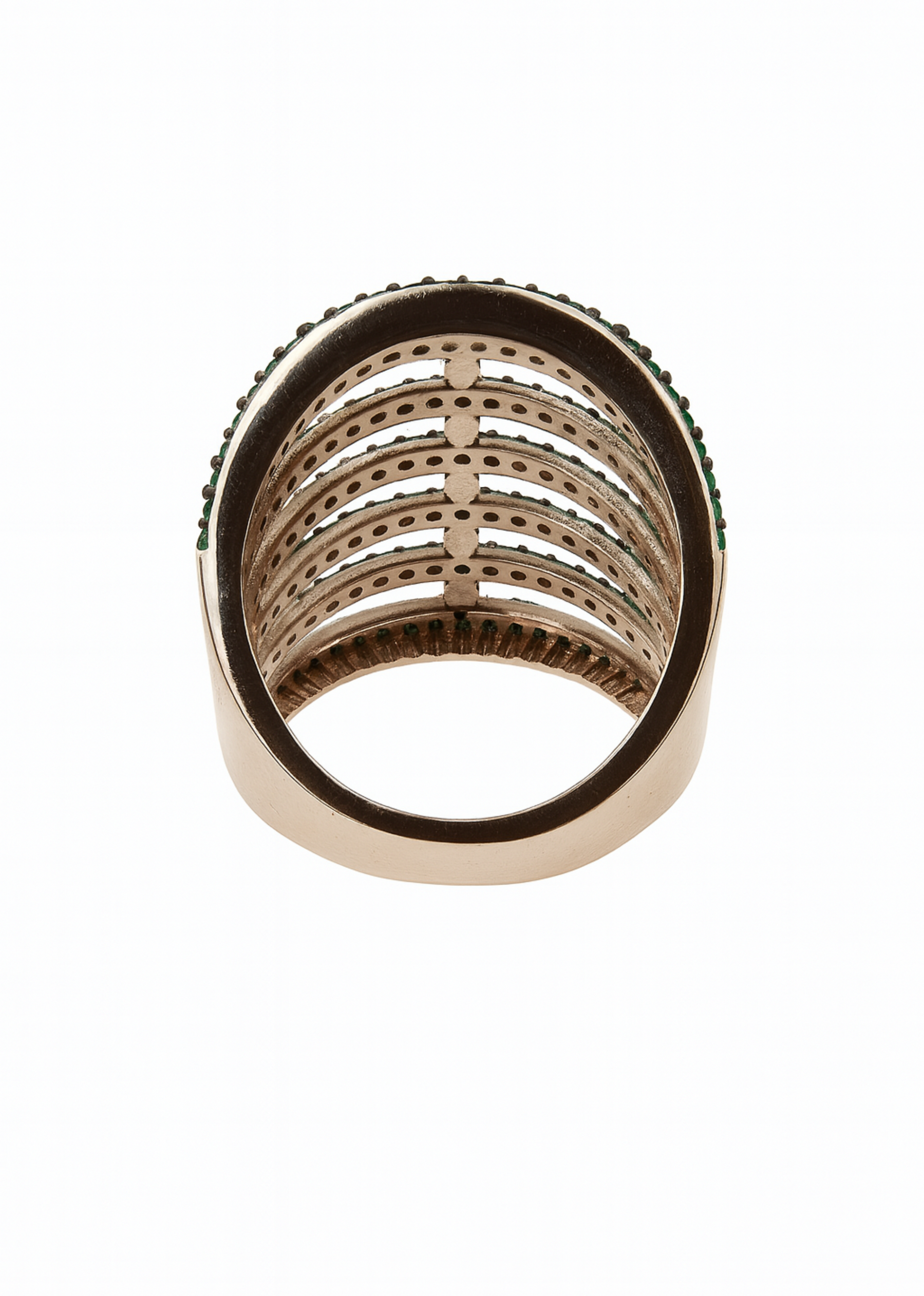 Gold ring with intricate design on a white background