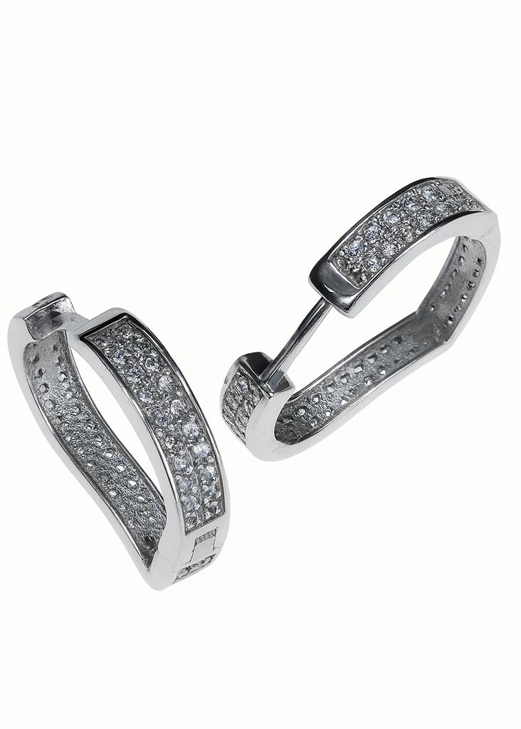 Pair of silver hoop earrings with embedded stones on a white background