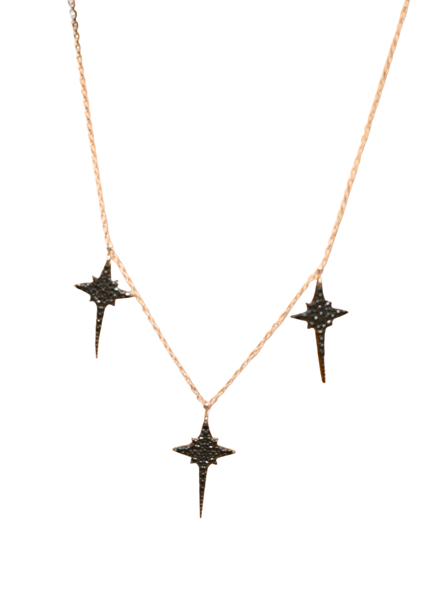Necklace with star-shaped pendants on a light background