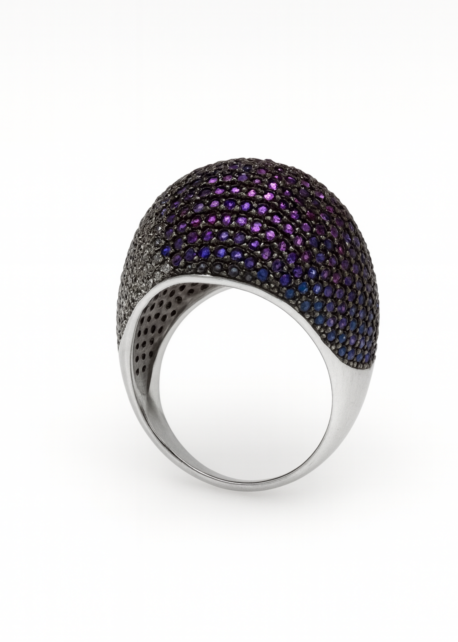 Ring with purple gemstones on a white background