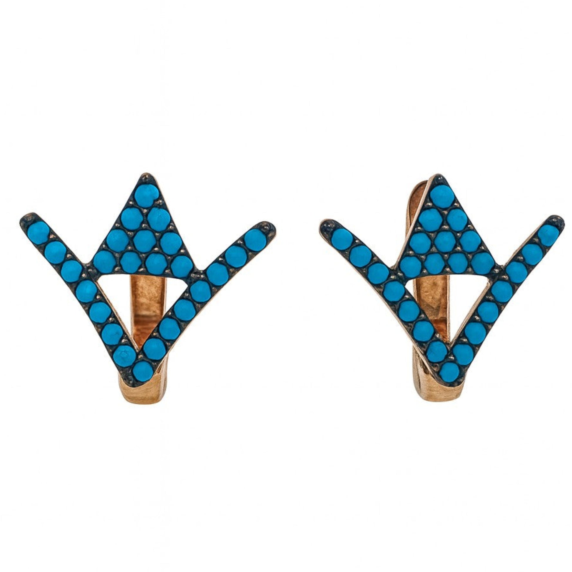 Pair of earrings with blue triangular design on a white background