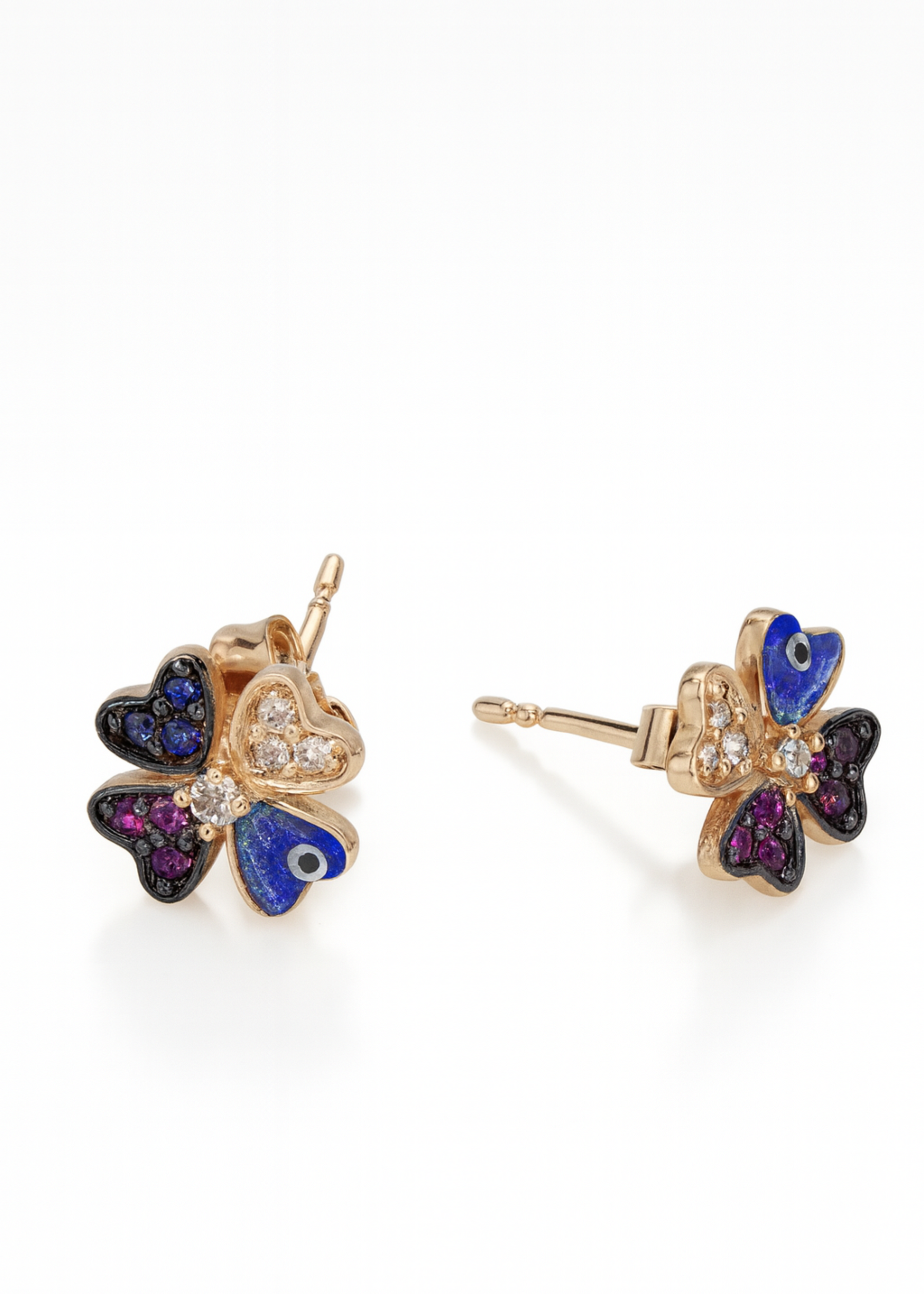 Butterfly-shaped earrings with colorful gemstones on a white background