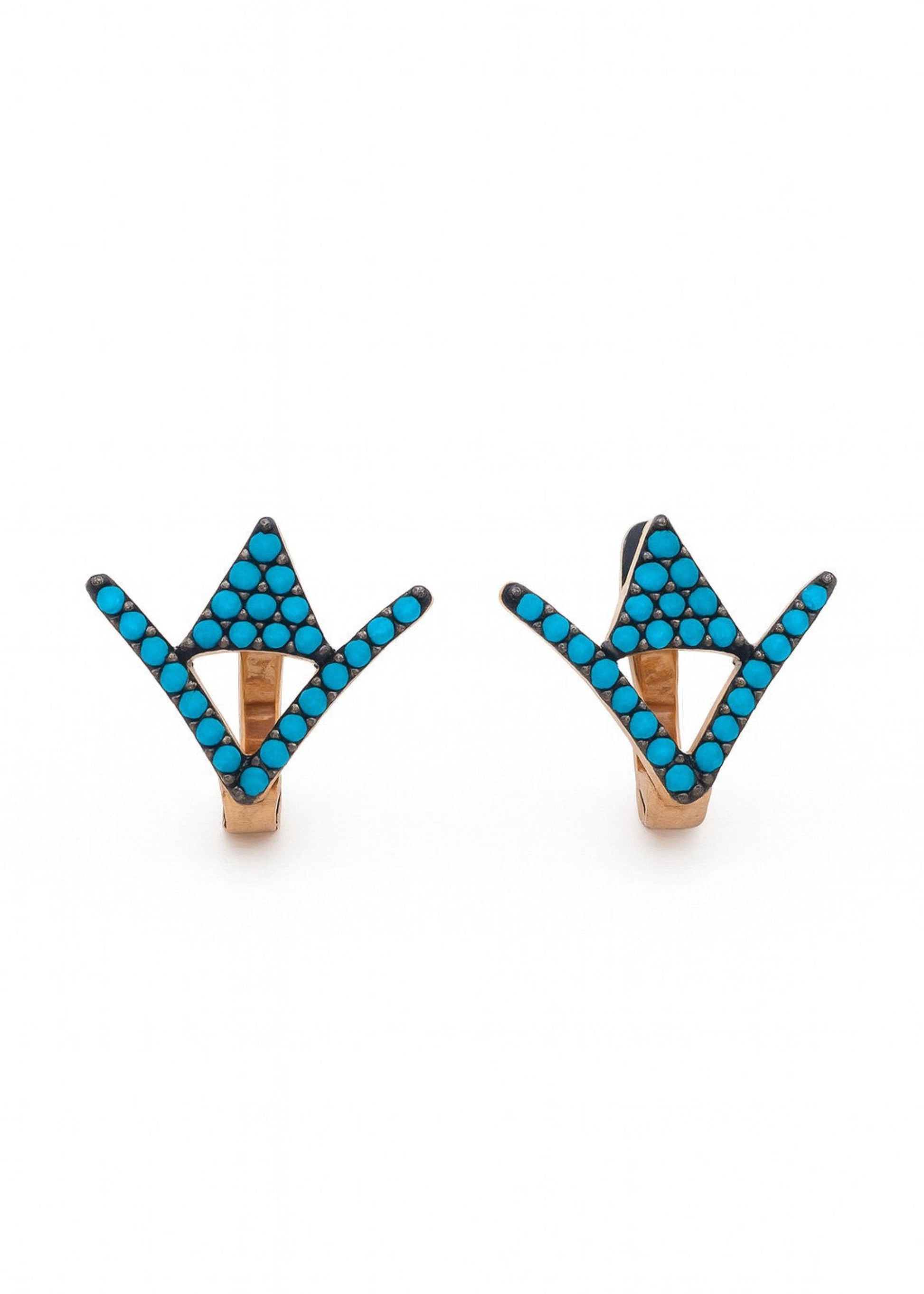 Pair of earrings with blue triangular beads on a white background