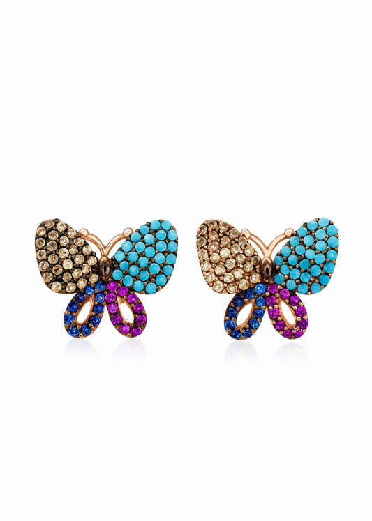 Butterfly-shaped earrings with multicolored gemstones on a white background