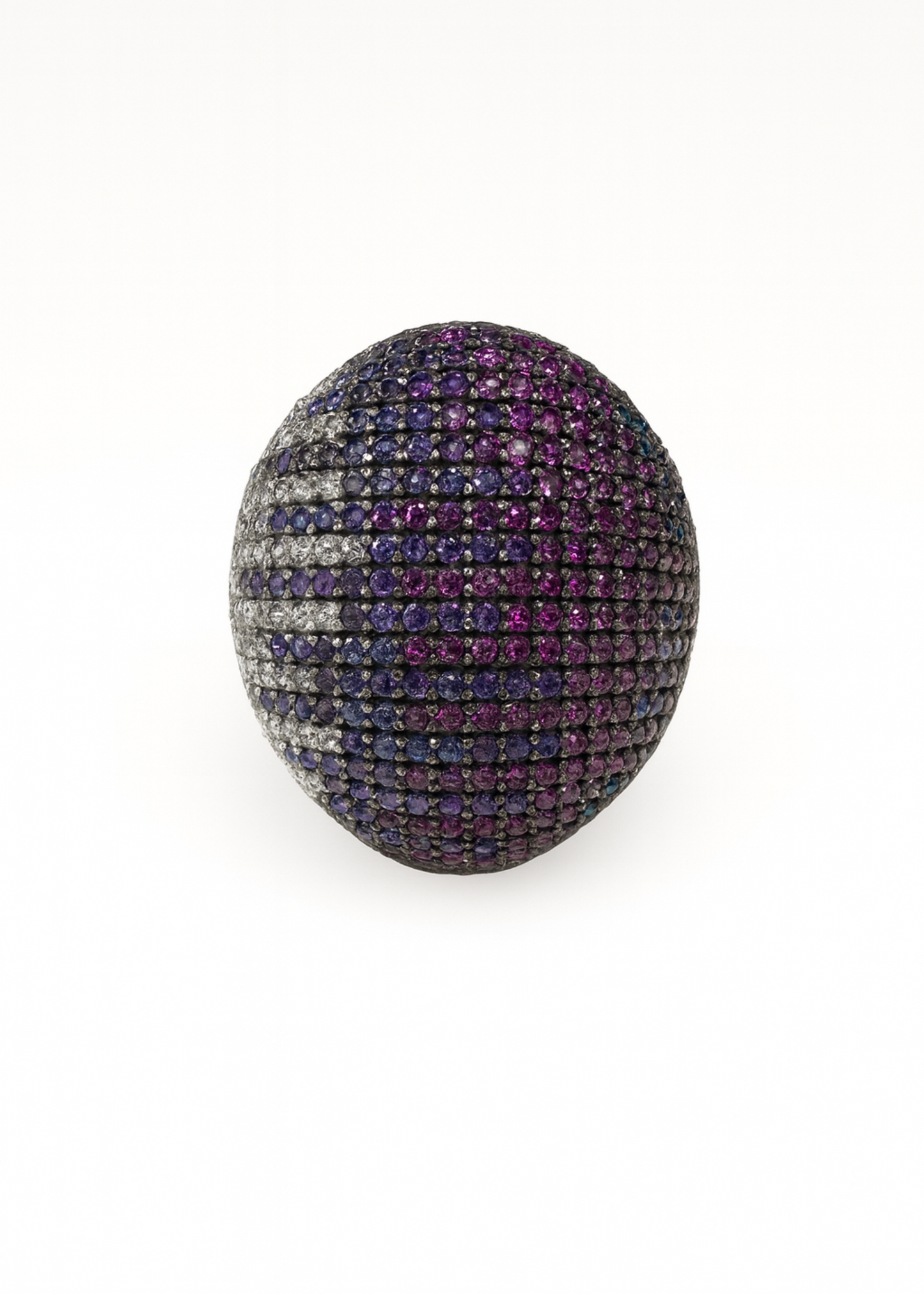 Egg-shaped jewelry piece with purple and black gemstones on a white background