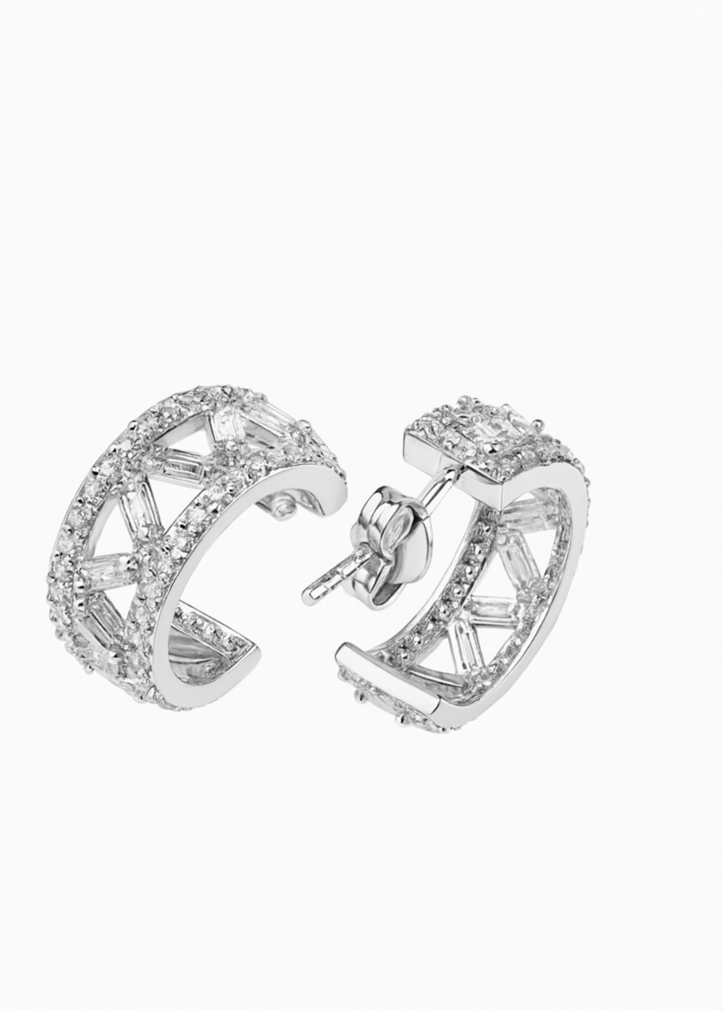 Pair of silver hoop earrings on a white background