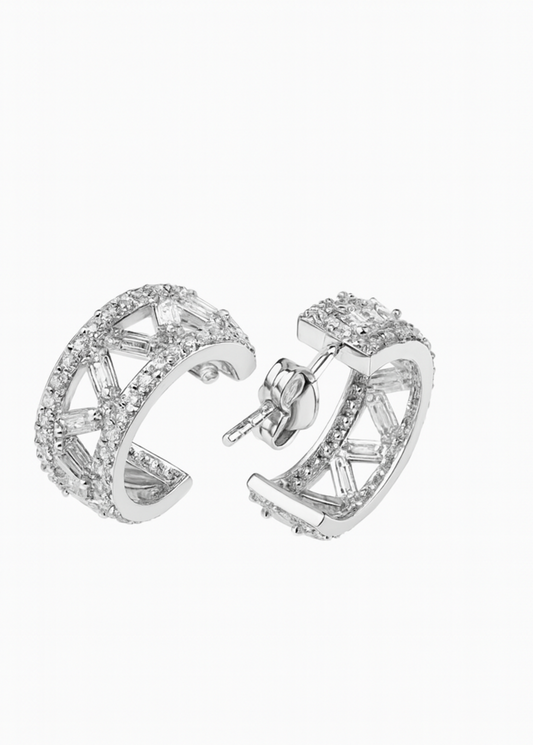 Pair of silver hoop earrings on a white background