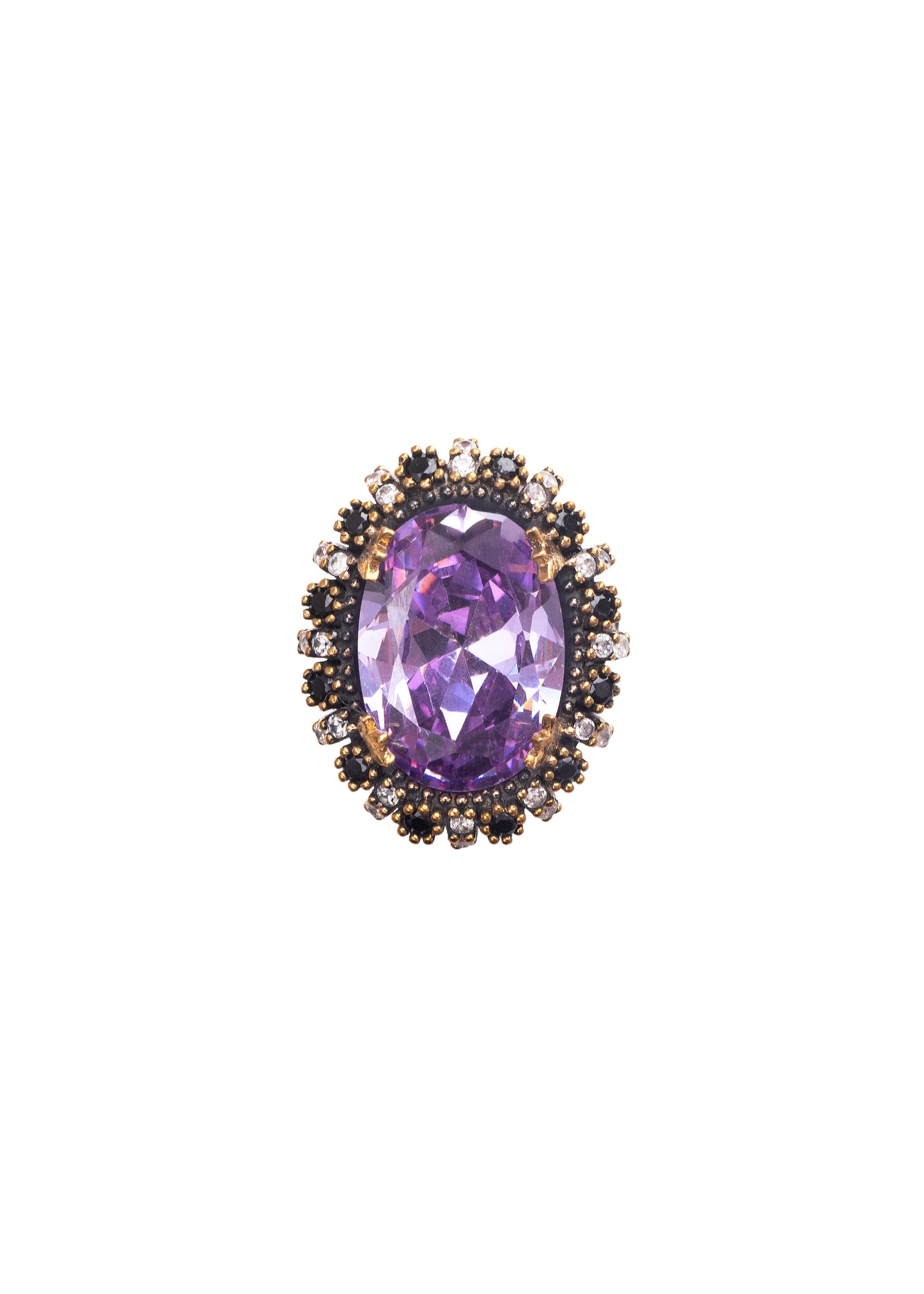 Purple gemstone in a decorative metal setting on a white background