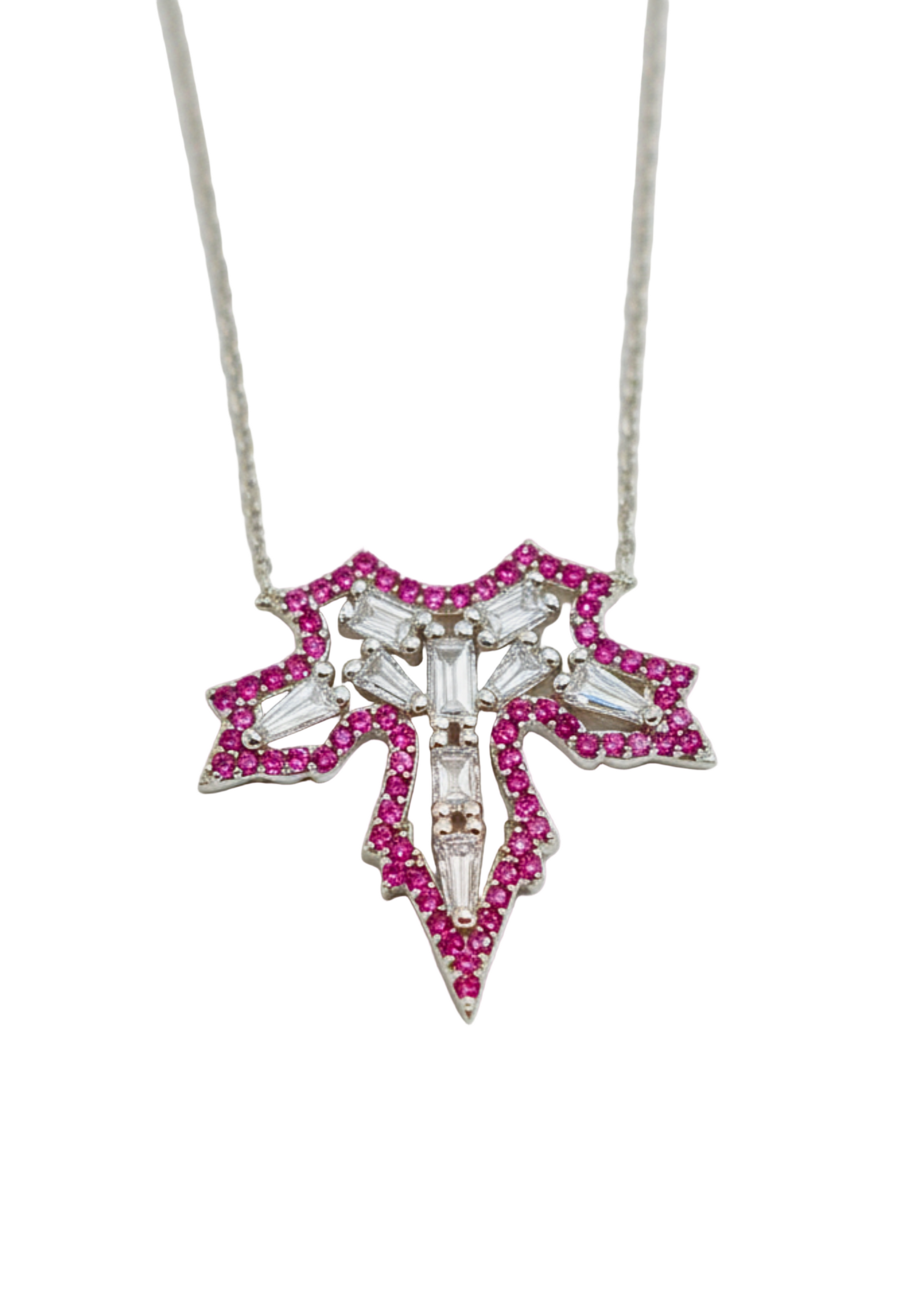 Necklace with a decorative pendant featuring pink and clear stones on a light gray background